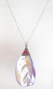 A 925 silver pendant necklace with mother of pearl gem set pendant strung on an Italian silver