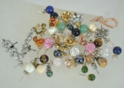 A quantity of post back earrings to include rhinestone, rose quartz, lapis lazuli. Approx 20 pairs.