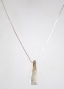 A 925 silver pendant necklace with obelisk drop pendant. Measures 16 inches.