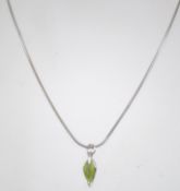 A 925 silver pendant necklace with enamel leaf drop pendant. Measures 16 inches.