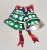 A vintage goldtone and enamel Christmas tree brooch with rollover catch.