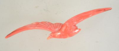 A vintage Art deco celluloid brooch pin in the form of an albatross with c clasp. Measures 8cms.