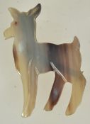 A vintage bakelite figural brooch pin in the form of a deer. Measures approx 7 cms.
