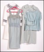 A group of retro / vintage ladies clothi