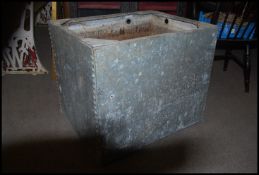 A reclaimed galvanised steel water tank
