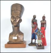 A collection of tourist wares from Africa and Egypt to include figures from both regions please see