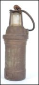 An early 20th Century NIFE miner's lamp,
