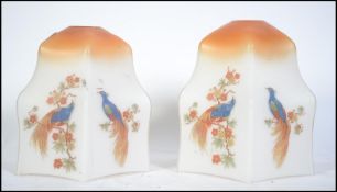 A pair of 1930's Art Deco glass light sh