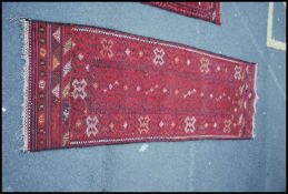 An early 20th century long handwoven Per
