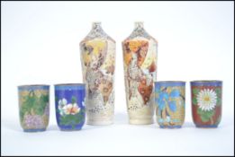 A pair of Japanese satsuma bottle vases