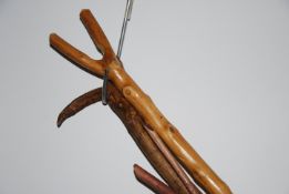 A collection of four 20th century thumb