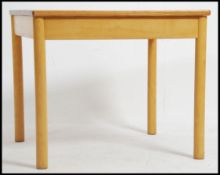 A vintage retro Ercol blond wood coffee