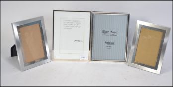 A group of easel back picture frames. Va