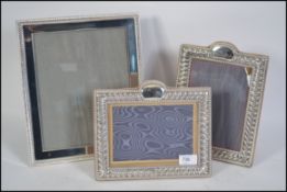 A pair of silver plated easel back glaze