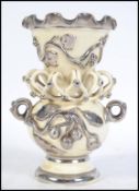 A 19th century lustered embellished vase