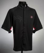 A signed Michael Jordan branded basketball jersey,