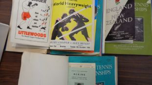 Three binder files of sports programmes 1950s and 1960s, including Wimbledon tennis, boxing,