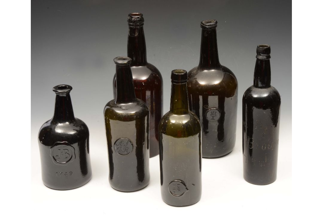 TWO 19TH CENTURY OXFORD COLLEGE SEALED WINE BOTTLES 'TCCR' (Trinity College Common Room) and ASCR in