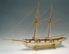 Wooden Armed Schooner Model Ship a finely made quality model, in wood, 27 inches in length, with a