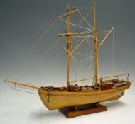 Wooden Schooner Model Ship a finely made quality model, in wood, 27inches in length, c/w stand in
