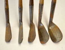 5x Left hand irons including 4x mashies by makers including Gibson, D Adams, Winton, Martin and