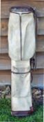 Good leather and canvas oval golf bag complete with ball pocket, original shoulder strap (some