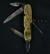 Sporting pen knife c.1900 - fitted with brass panels embossed with a gymnast on the one side and