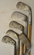 6x Mashie irons including a Tom Stewart driving mashie with Stewart's oval maker's mark and