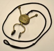 Victorian ladies brass tennis skirt lifter - embossed slide c/w cord, missing one damper