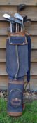 12x Assorted irons, woods and putters together in a canvas and leather golf bag, to incl a