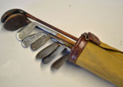 Set of golf clubs and canvas golf bag - to incl Bush Cromer striped top spoon, 3x irons stamped E.