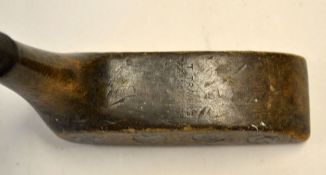 Rare T Travers patent rectangular dropped toe dark stained persimmon putter - with 11x circular lead