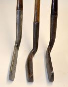 2x Gourlay putters incl a Gem and bent neck blade with decorative ball and flower central face