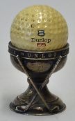 Dunlop 'Hole In One' Golf Ball Trophy with crossed clubs stamped E&Co, with No 8 Dunlop 65 ball,