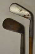 2x W Park Maker Musselburgh smf irons, a cleek and a niblick showing the maker's mark to the shaft -