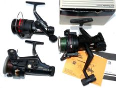 REELS: (3) Abu Garcia Cardinal 855 free spool bait runner type reel, left right hand wind, skirted