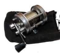 REEL: Abu Ambassadeur 6500C multiplier reel, silver 3 screw smooth end plate, high speed model, foot