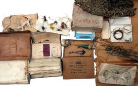 ACCESSORIES: Interesting collection of early trout flies to gut in two early leather pocket wallets,