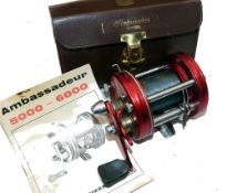 REEL: Abu Sweden Ambassadeur 6000 red multiplier reel, grooved end plates, 4 screw model, foot stamp