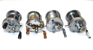 REELS: (4) Four American bait casting multiplying reels with various fishing scene designs, models