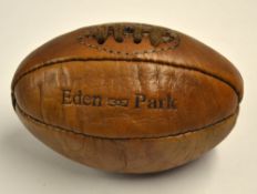 Fine New Zealand Eden Park miniature brown leather rugby ball - c/w original aces and embossed to