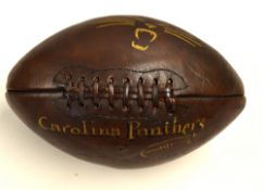 Fine American Carolina Panthers brown leather football - gilt embossed with clubs mascot 