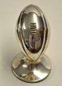 1925 Silver rugby ball hall marked Birmingham 1925 mounted on a small circular base overall 3