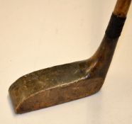 Rare T Travers patent rectangular dropped toe dark stained persimmon putter - with 11x circular lead