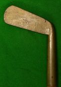 An early heavy thick straight blade gun metal putter stamped Murray and the fourth rubber company of