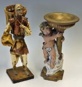 Hand Crafted Papier-mâché Folk Art Figure of a gentleman carrying a basket around shoulders with