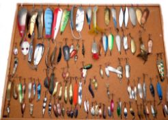 LURE DISPLAY: Large collection of metal spinning baits and lures up to 7