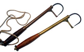 GAFFS: (2) Pair of Victorian brass extending salmon gaffs, both with turned wooden handles, hinged