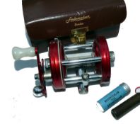 REEL: Fine early Abu Sweden Ambassadeur 6000 red multiplier reel ,4 screw grooved end plate, white