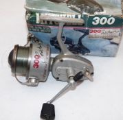 REEL: Mitchell 300 Ltd Edit 50th Anniversary spinning reel, silver finish red black graphics,